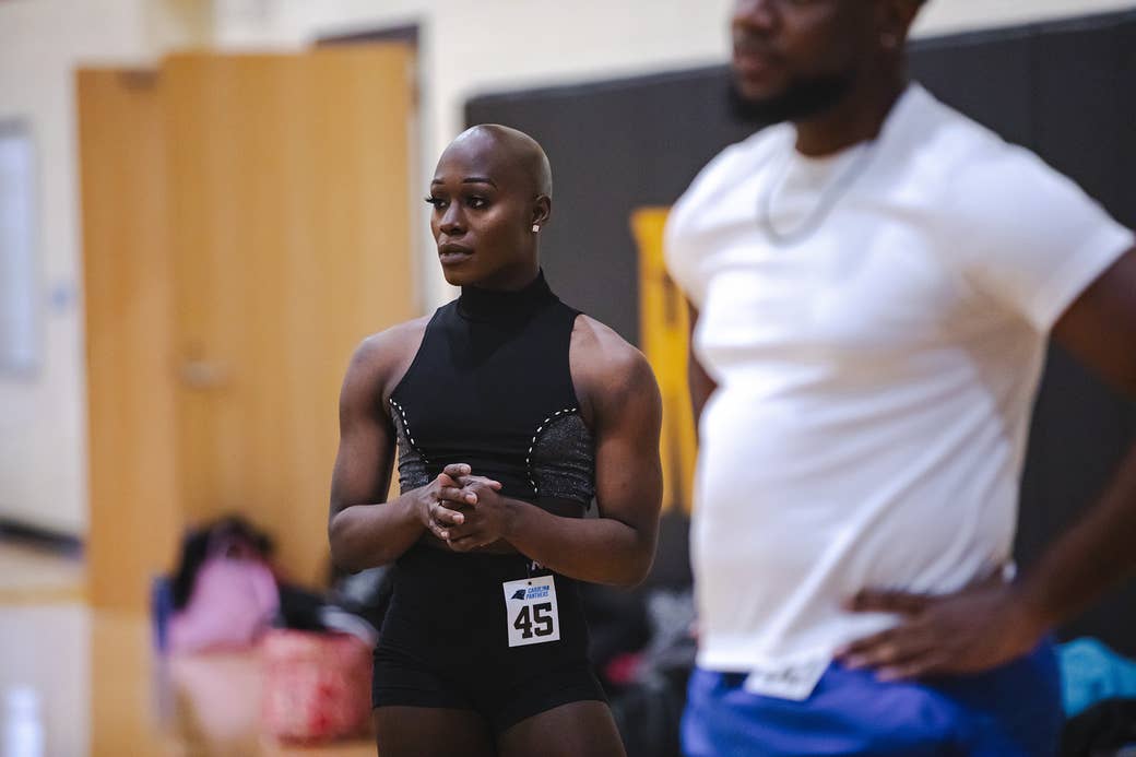 Justine Lindsay in a turtleneck clasps her hands during her audition for the Carolina Panthers