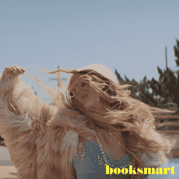 Gigi, hair blowing in the wind in Booksmart