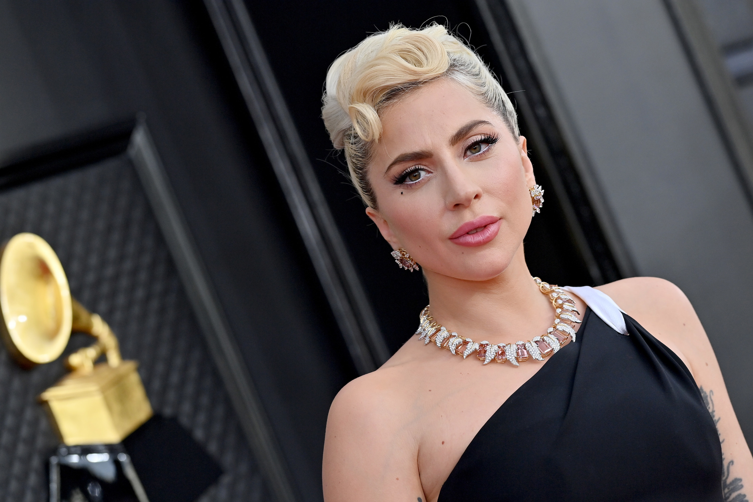 Lady Gaga poses on the red carpet at the 64th Annual GRAMMY Awards at MGM Grand Garden Arena on April 03, 2022 in Las Vegas, Nevada