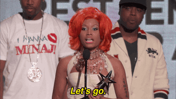 Rapper Nicki Minaj holding a BET Award on stage
