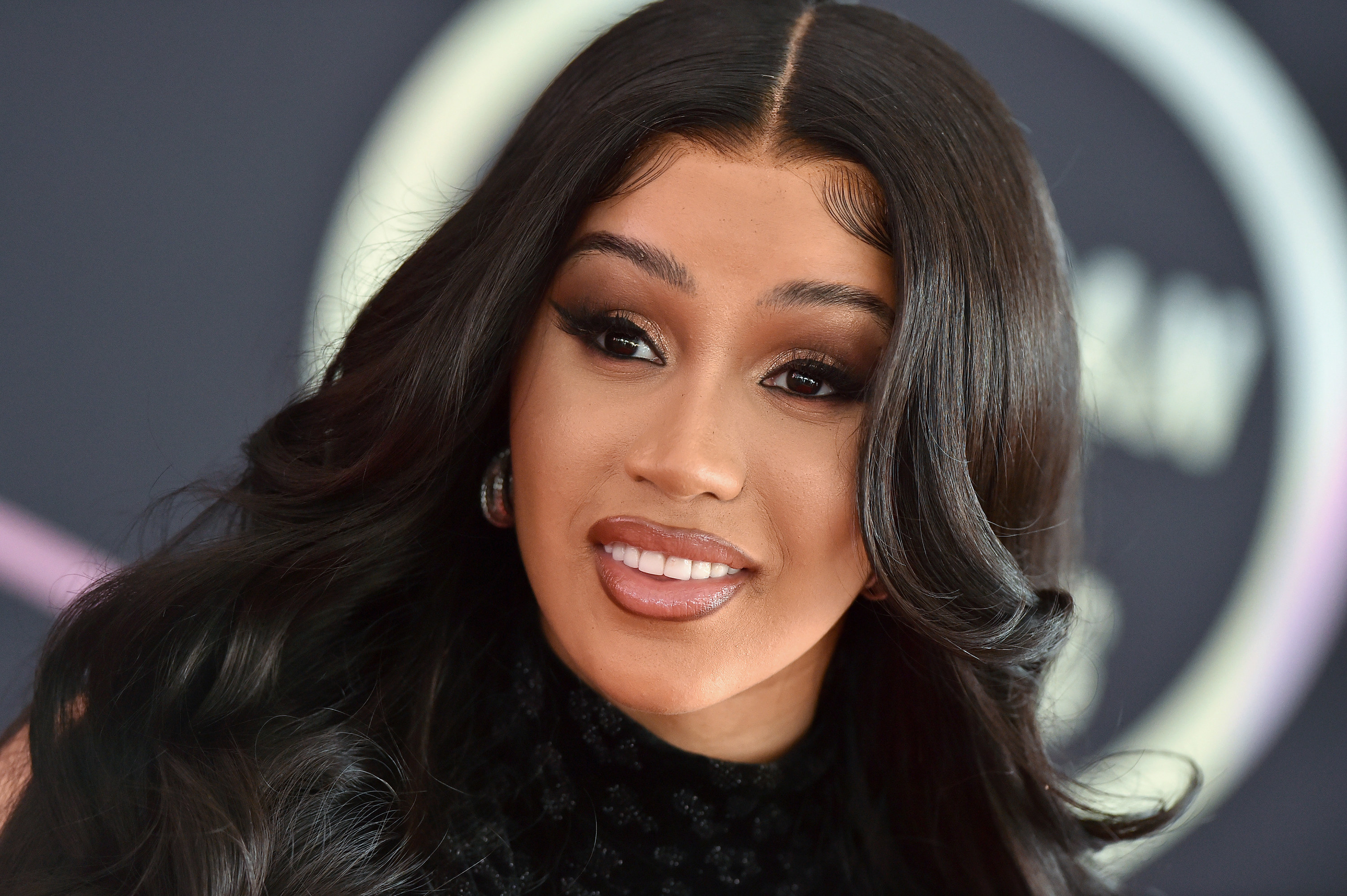 Cardi B poses on the red carpet for the 2021 American Music Awards on November 19, 2021 in Los Angeles, California