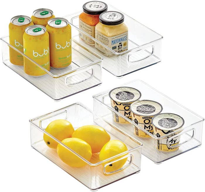 clear storage bins with packaged food in them