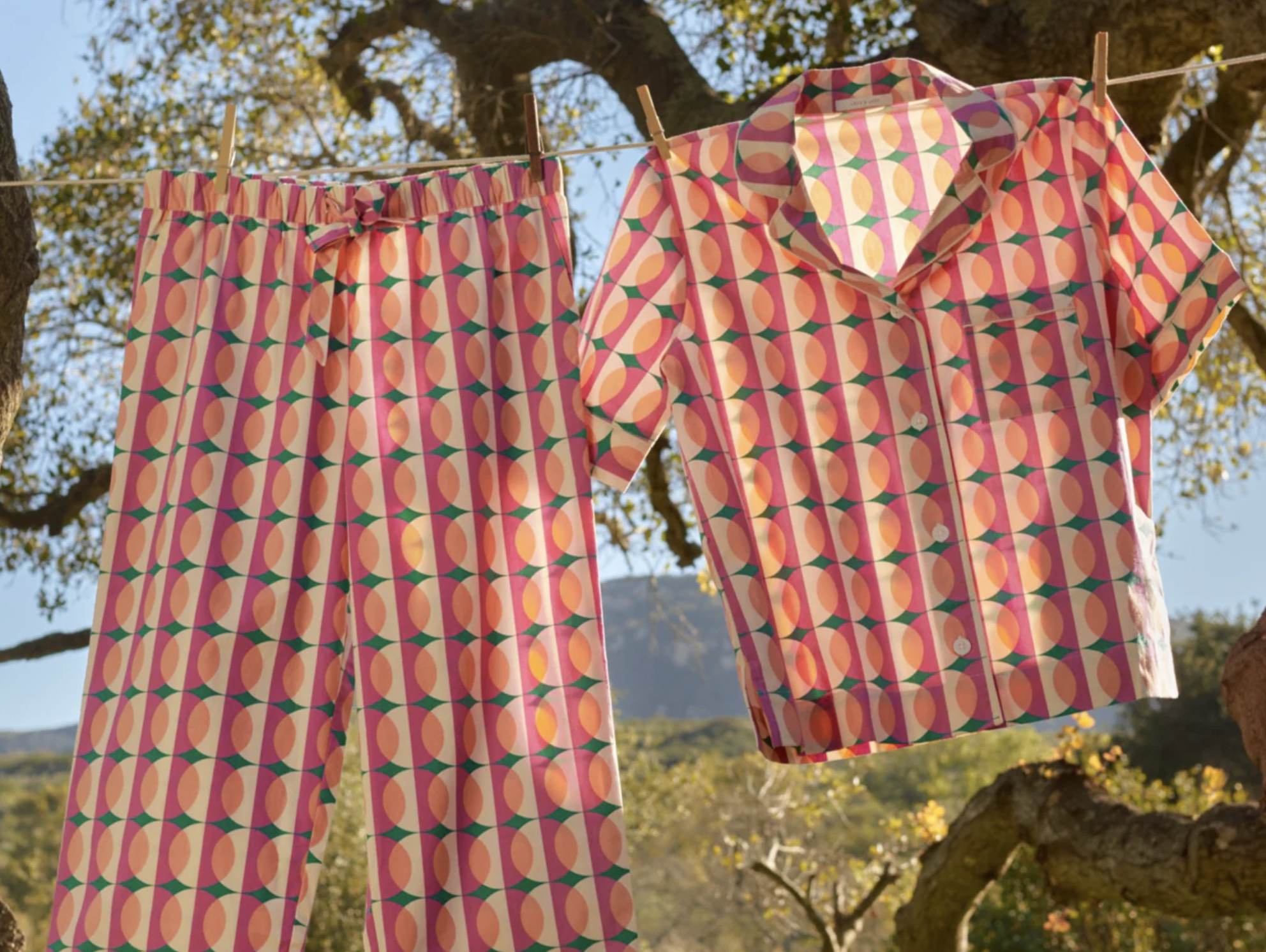 The pyjamas hanging on a clothesline outdoors