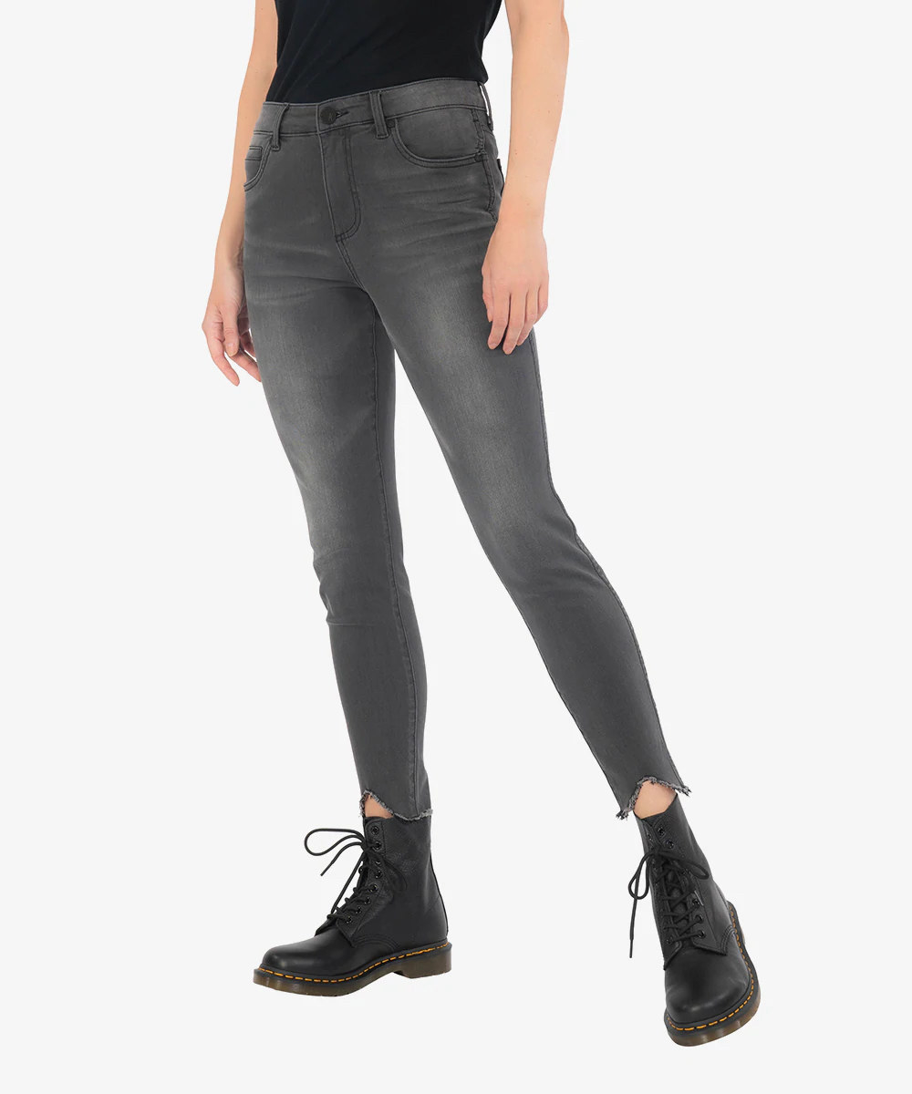 model wearing gray skinny jeans with black combat boots