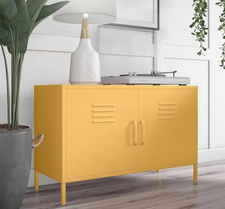 Yellow cabinet in white room