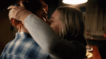 Archie and Betty kissing