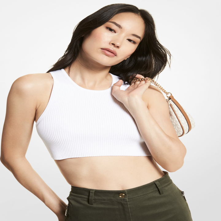 A person wearing the top with cargo pants