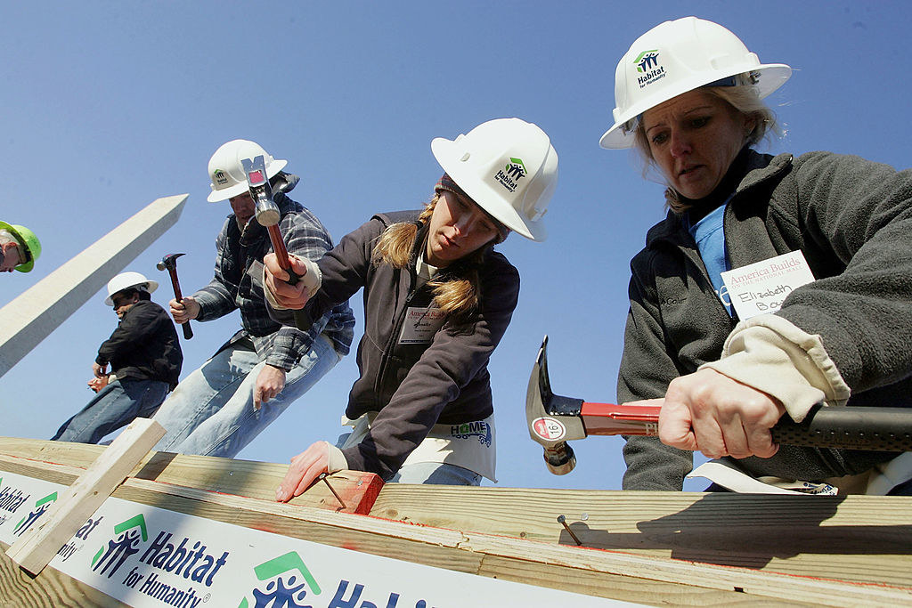 habitat for humanity people building a home