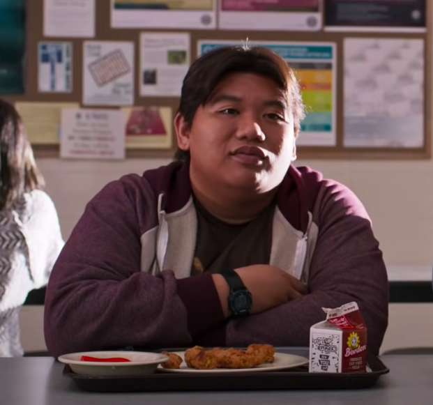Jacob Batalon sitting in the cafeteria