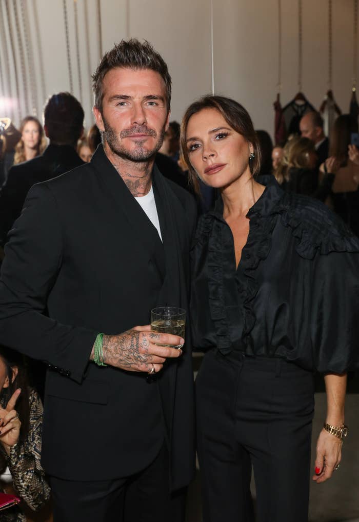 David and Victoria Beckham pose together at the Sotheby&#x27;s event celebrating Andy Warhol in September 2019