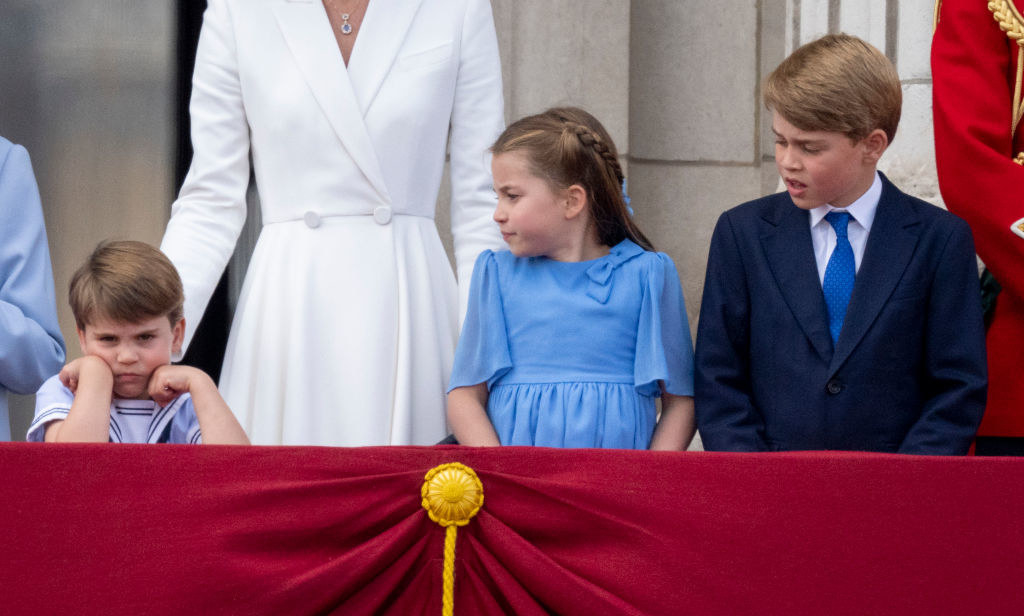 The other royal children look at Louis, who is frowning and looking dejected
