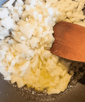 GIF of onions bubbling as they&#x27;re cooked in butter