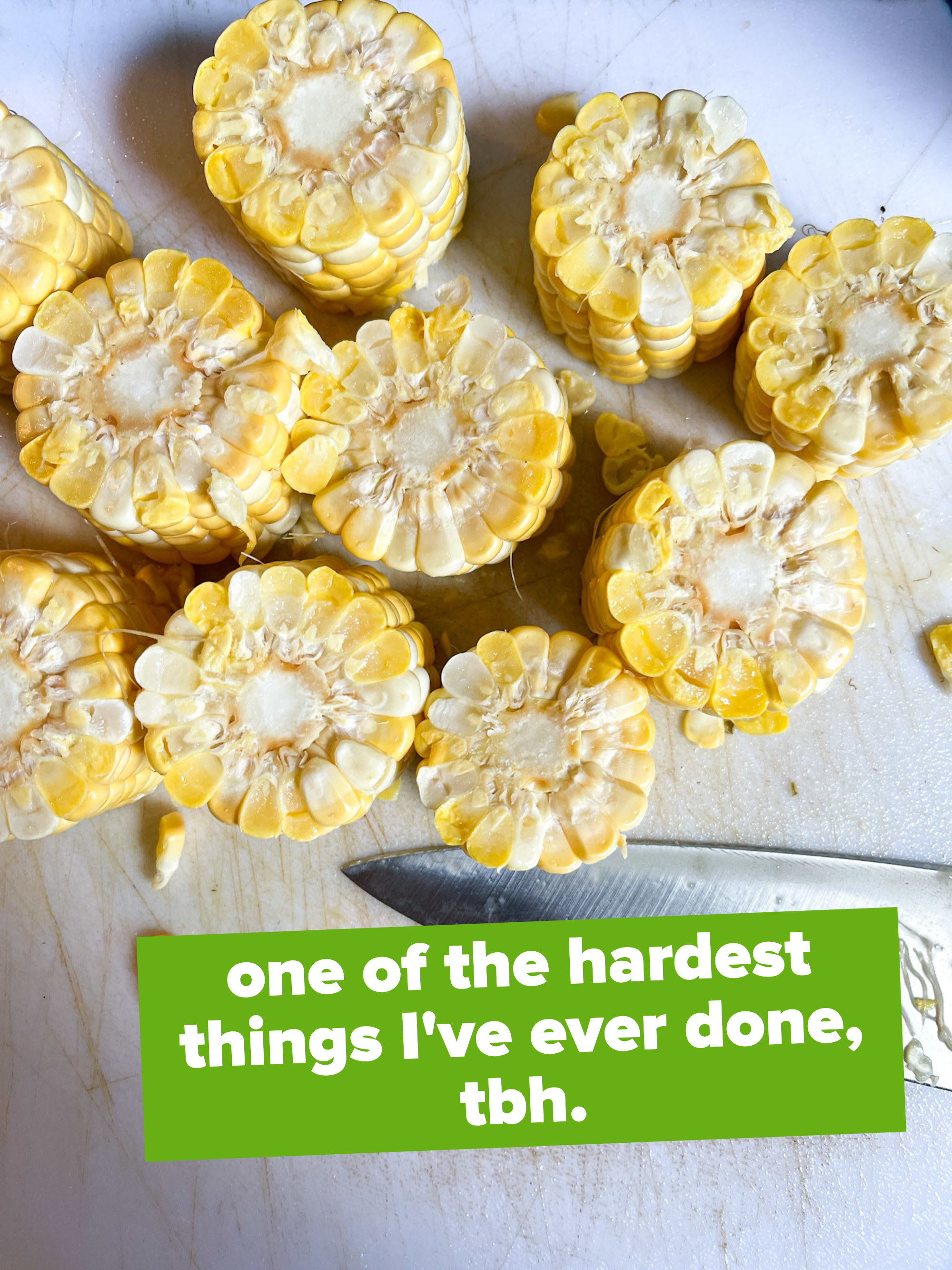 An aerial view of the sliced corn cobs with a caption that says cutting them was one of the hardest things the writer has ever done