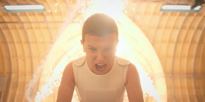 Eleven yelling as light erupts behind her