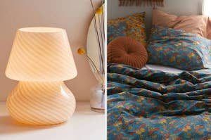on the left a small white glass lamp, on the right a teal, red, and yellow butterfly and floral print bedding set