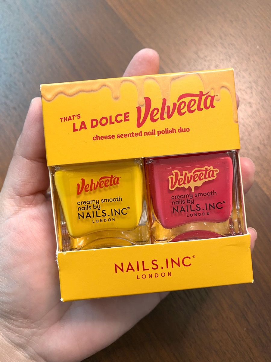 One box holds small jars of both nail polish