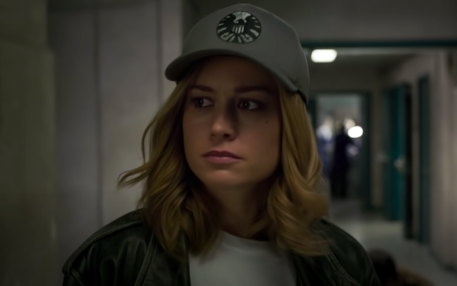 close up of Brie Larson in character wearing a baseball cap