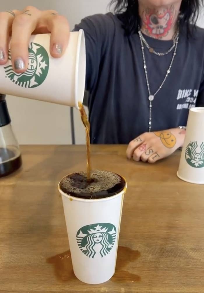 Coffee spilling over the edge of a venti cup