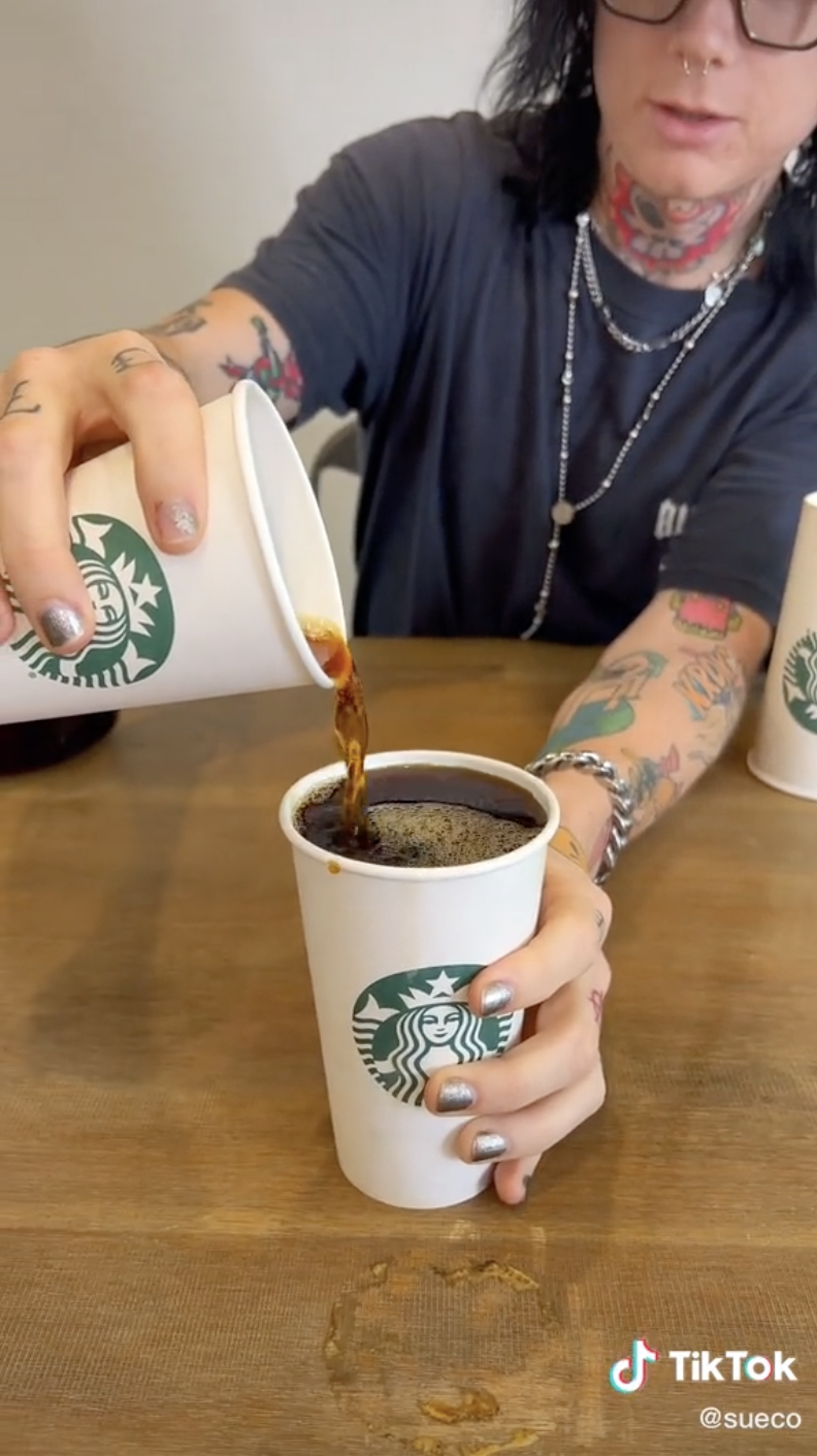 A man proved a large cup of Costa coffee fits into a regular cup
