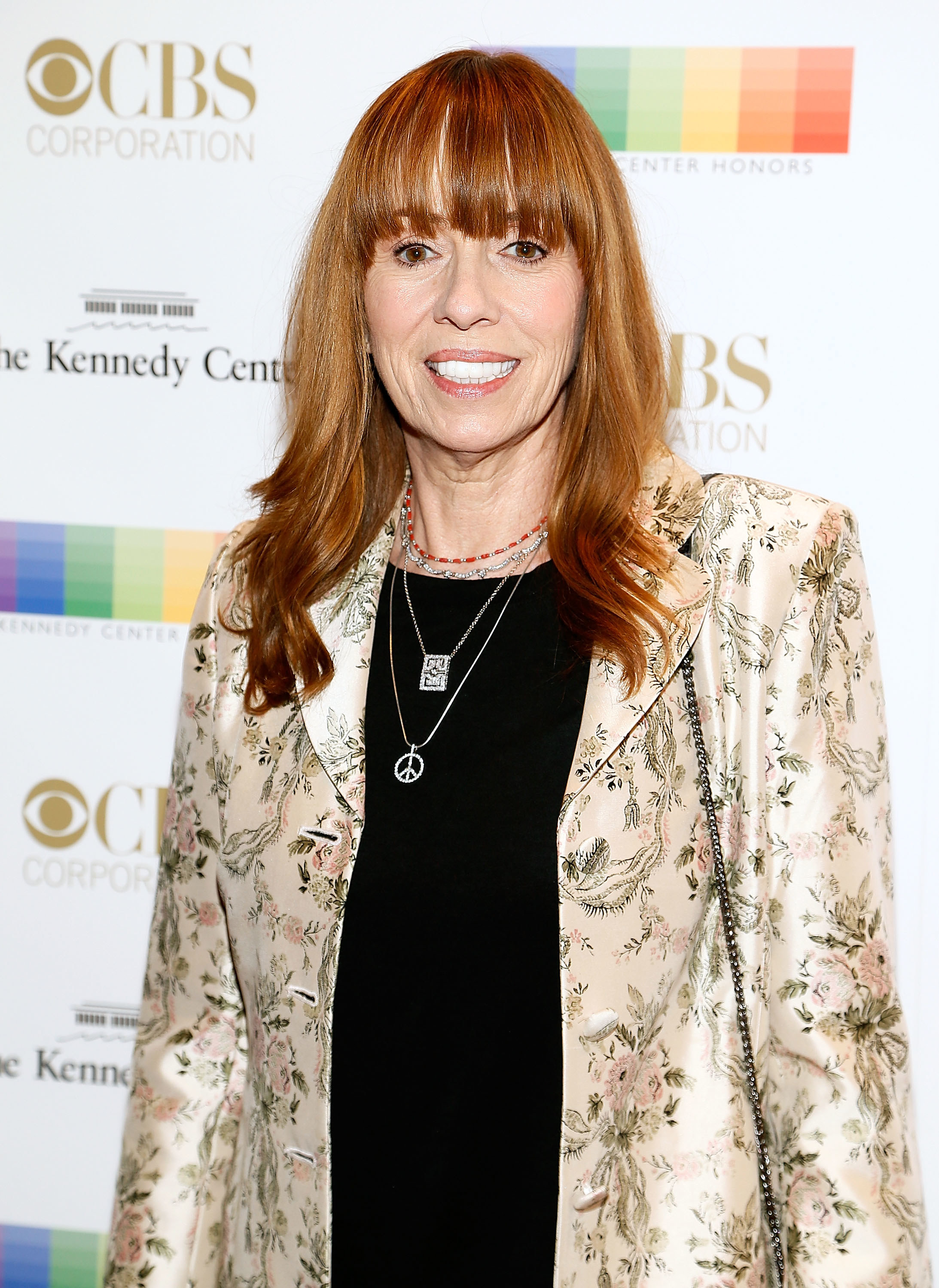 Mackenzie Phillips smiles at an event