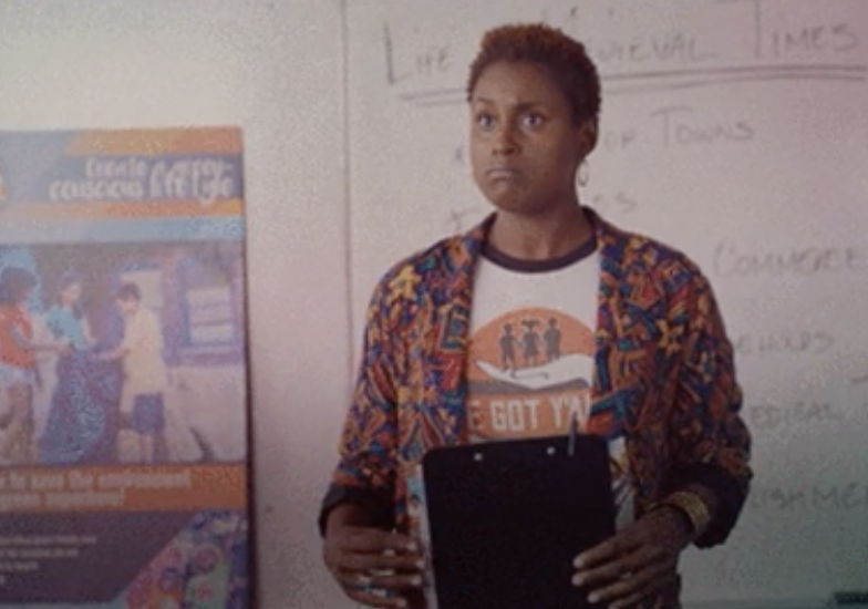 Issa Rae in &quot;Insecure&quot; giving a presentation