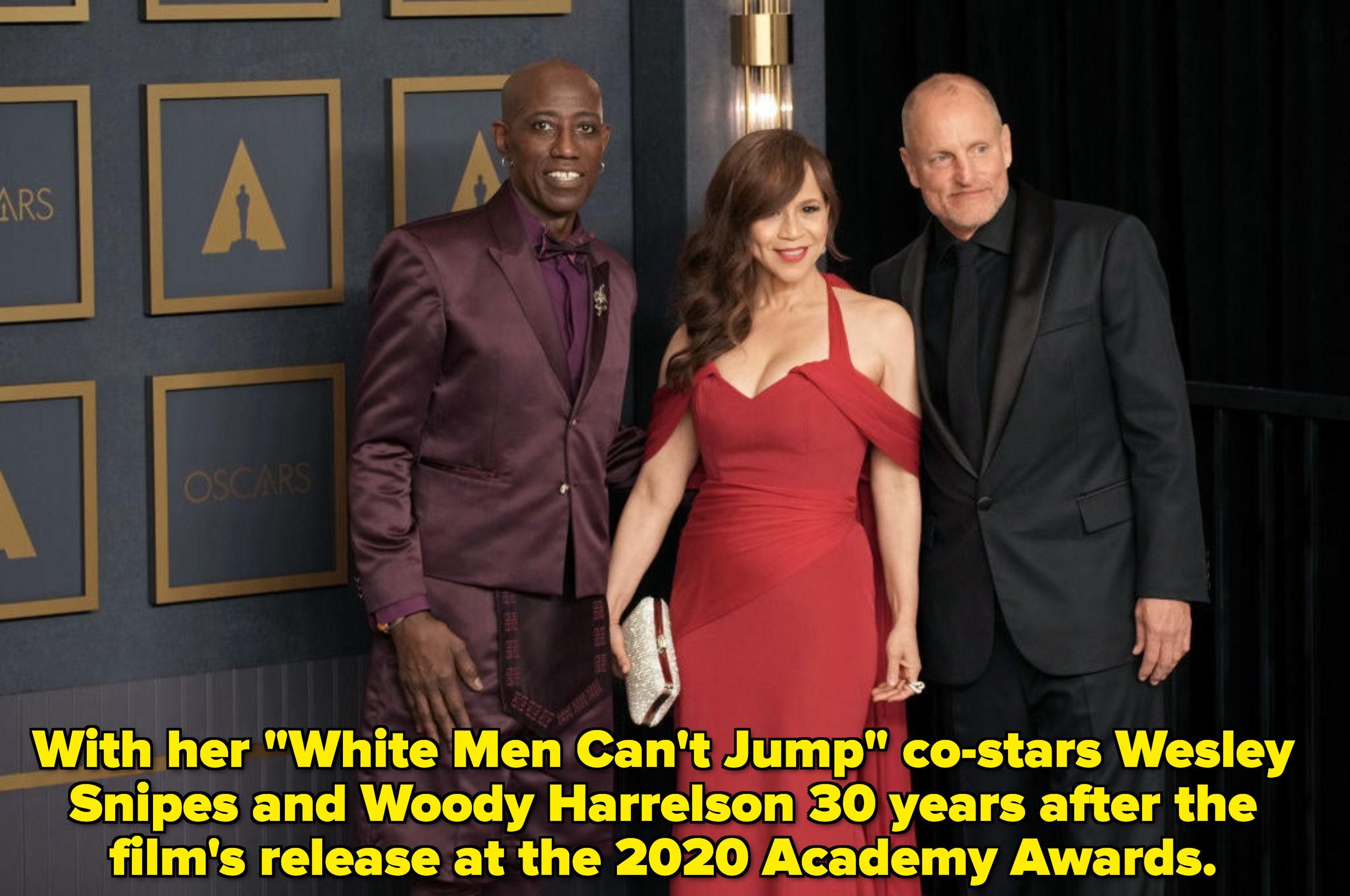 Wesley Snipes, Perez, and Woody Harrelson pose for a photo at the Academy Awards