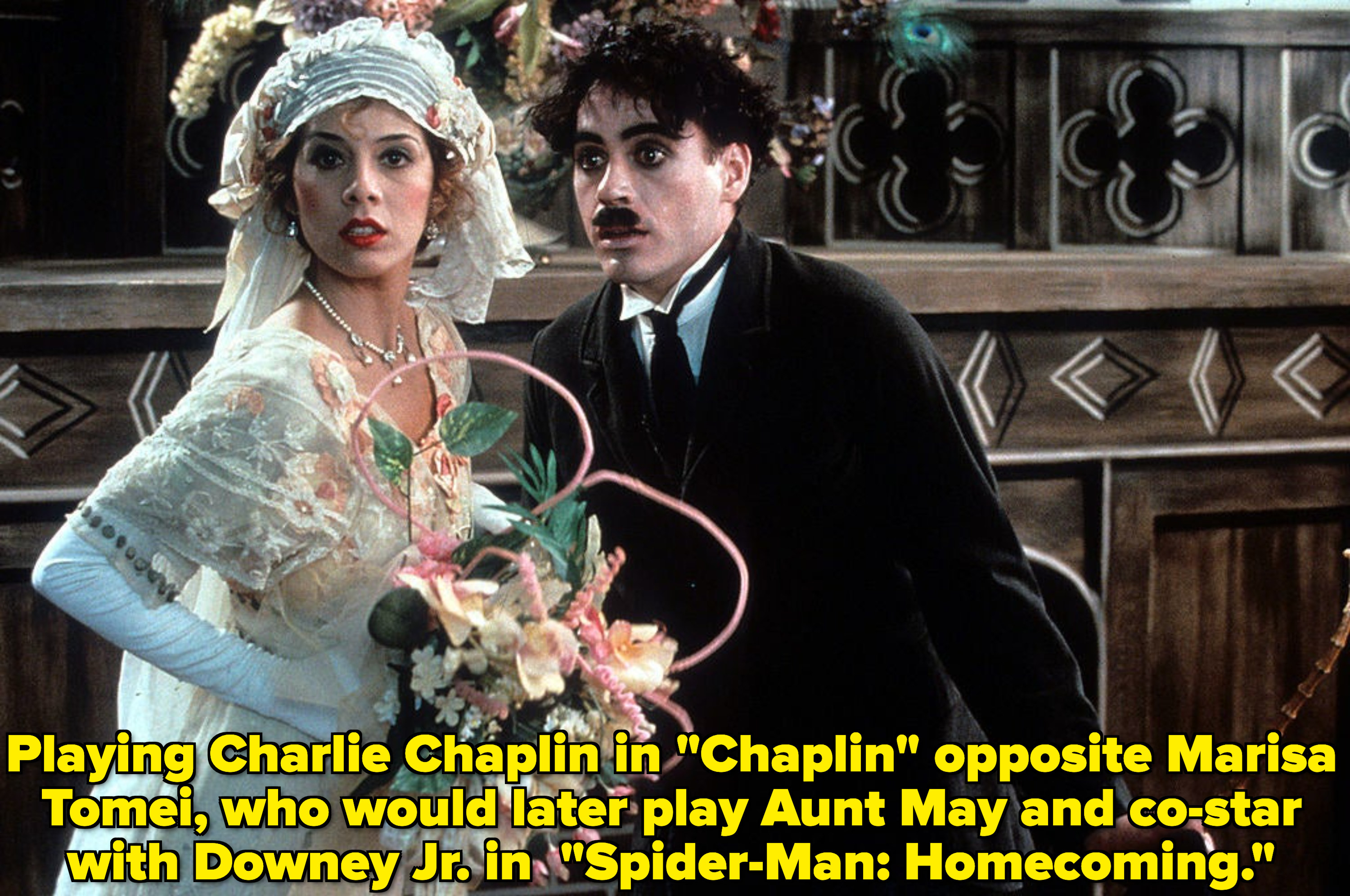 Marisa Tomei and Robert Downey Jr looking stunned in &quot;Chaplin&quot;