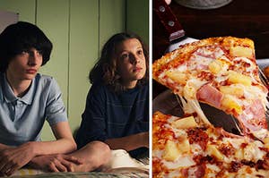 Mike Wheeler sits next to Eleven on her bed and a slice of Hawaiian pizza