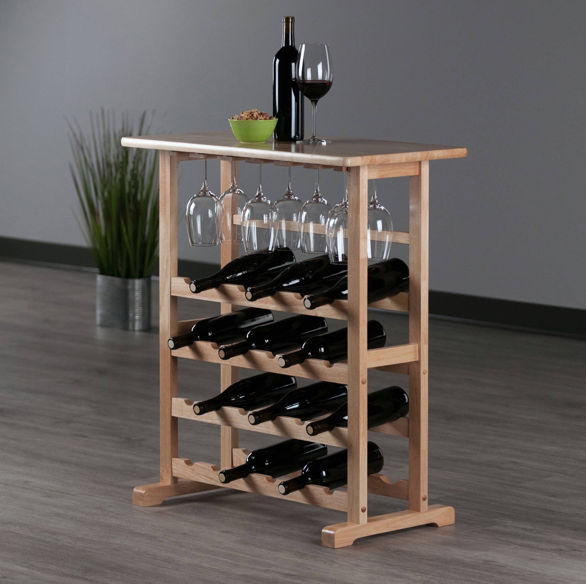 the wooden wine rack shelf with bottles and glasses displayed