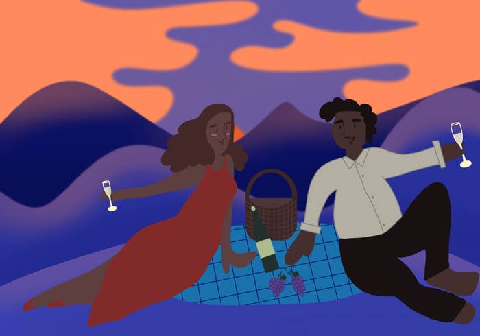 An illustration of two people of color sitting on a blanket enjoying a picnic
