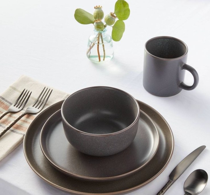Gray bowl with salad and dinner plate and mug from set