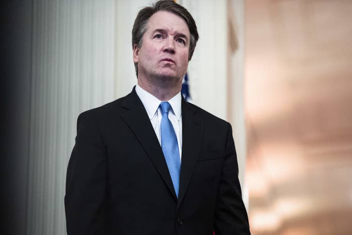 Brett Kavanaugh is shown wearing a suit and tie