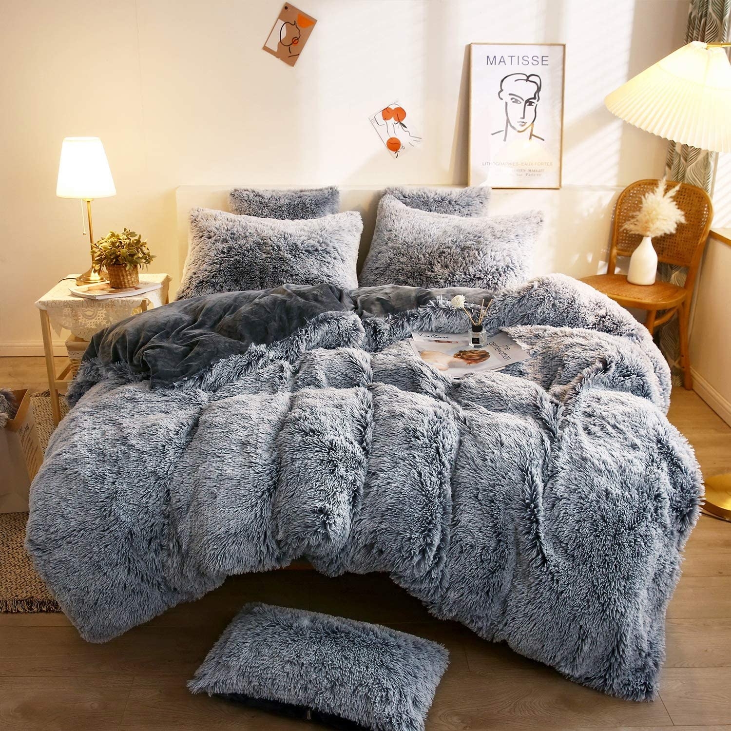 a fluffy bed set made of plush shag material in a scandinavian style bedroom