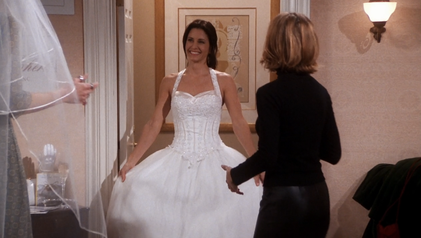 Monica in a wedding dress