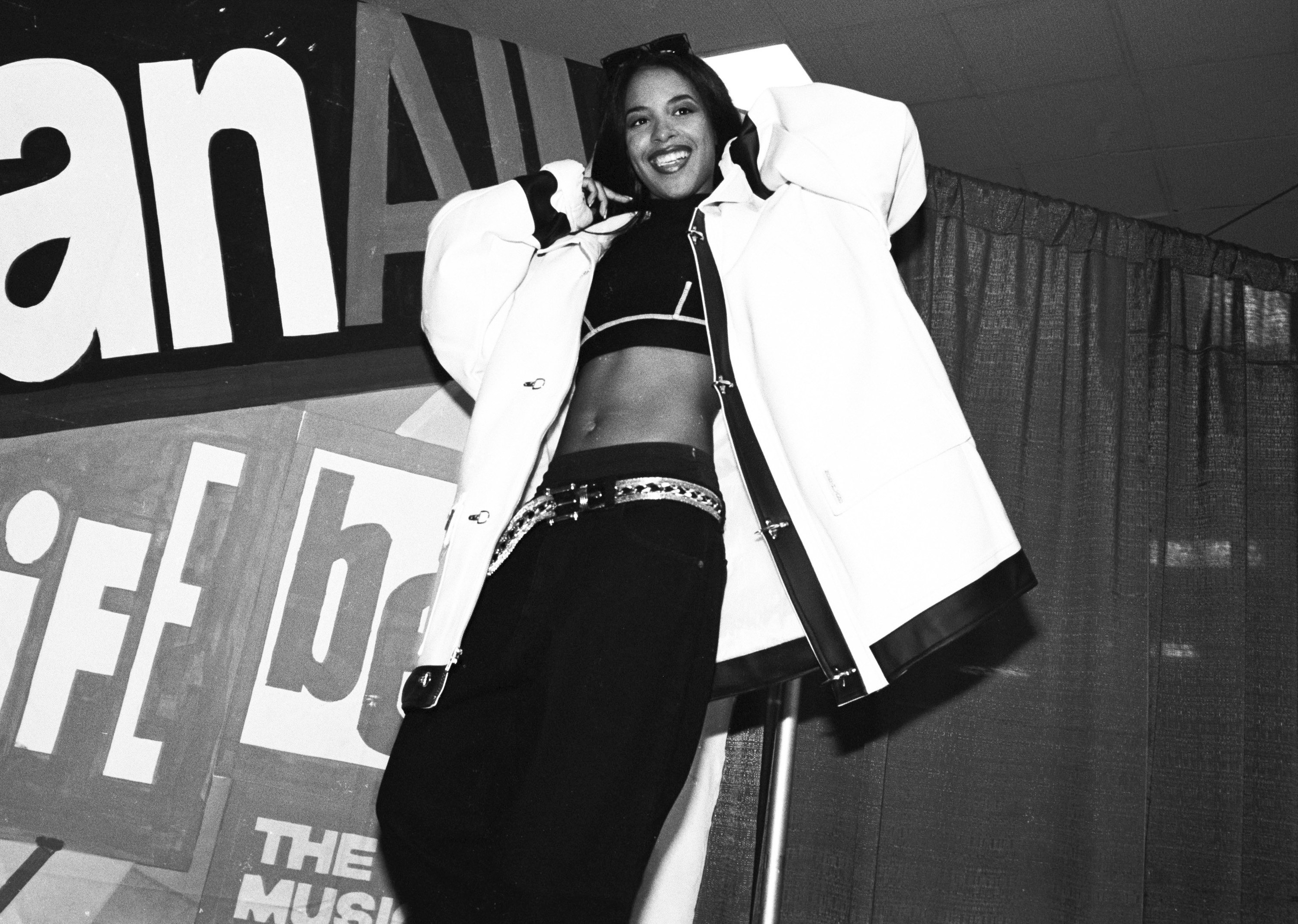 aaliyah onstage in an oversize jacket