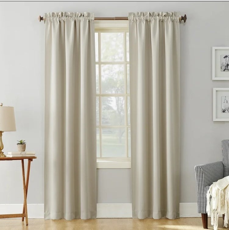 An image of a pearl solid blackout curtain panel