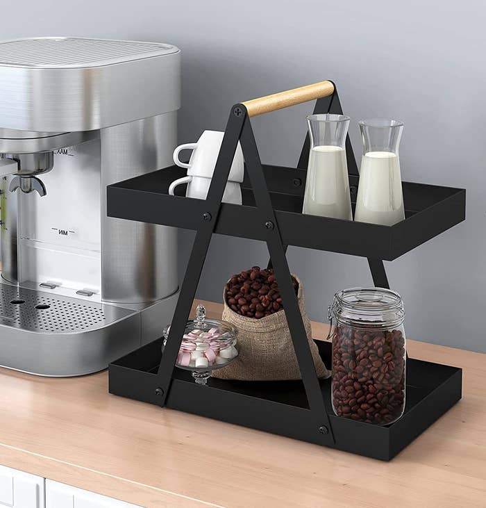 The tray with coffee supplies on it
