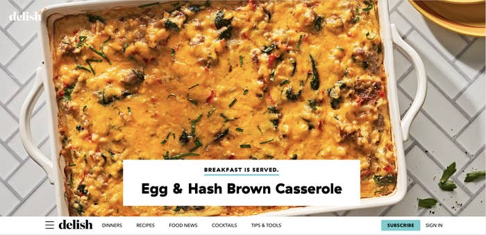 the Delish website with an egg and hash brown casserole on the main page