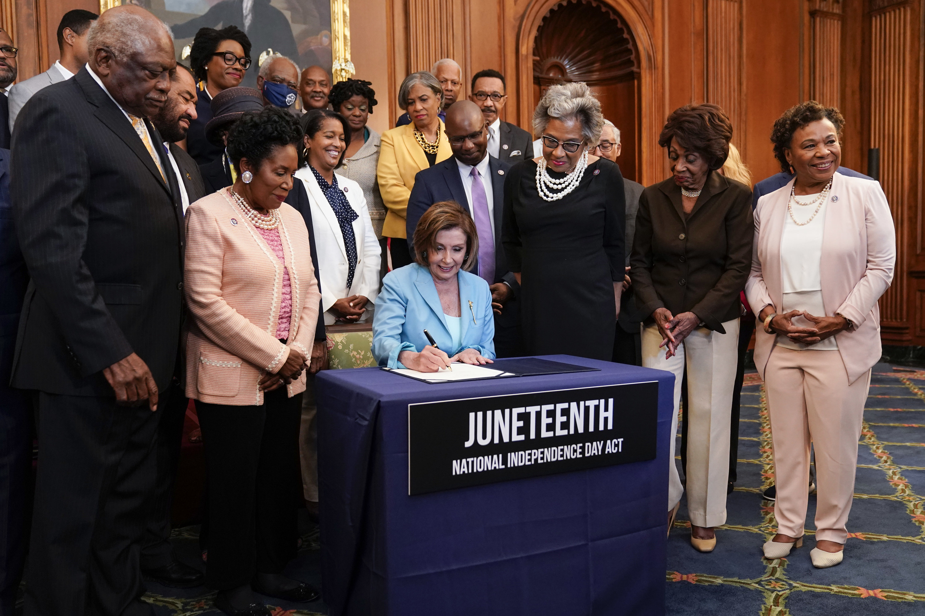 Speaker of the House Nancy Pelosi (D-CA) holds a bill enrollment signing ceremony for the Juneteenth National Independence Day