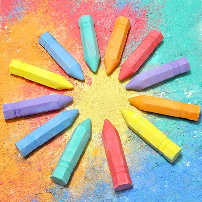 A variety of chalk sticks aligned in a circle