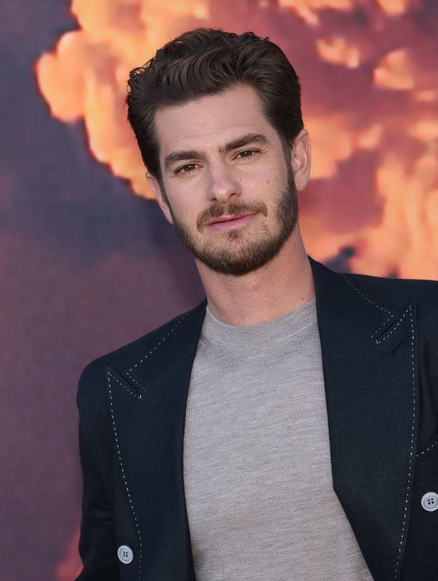 A closeup of Andrew Garfield with a beard