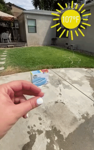 reviewer's gif of the pool in their yard on a hot day