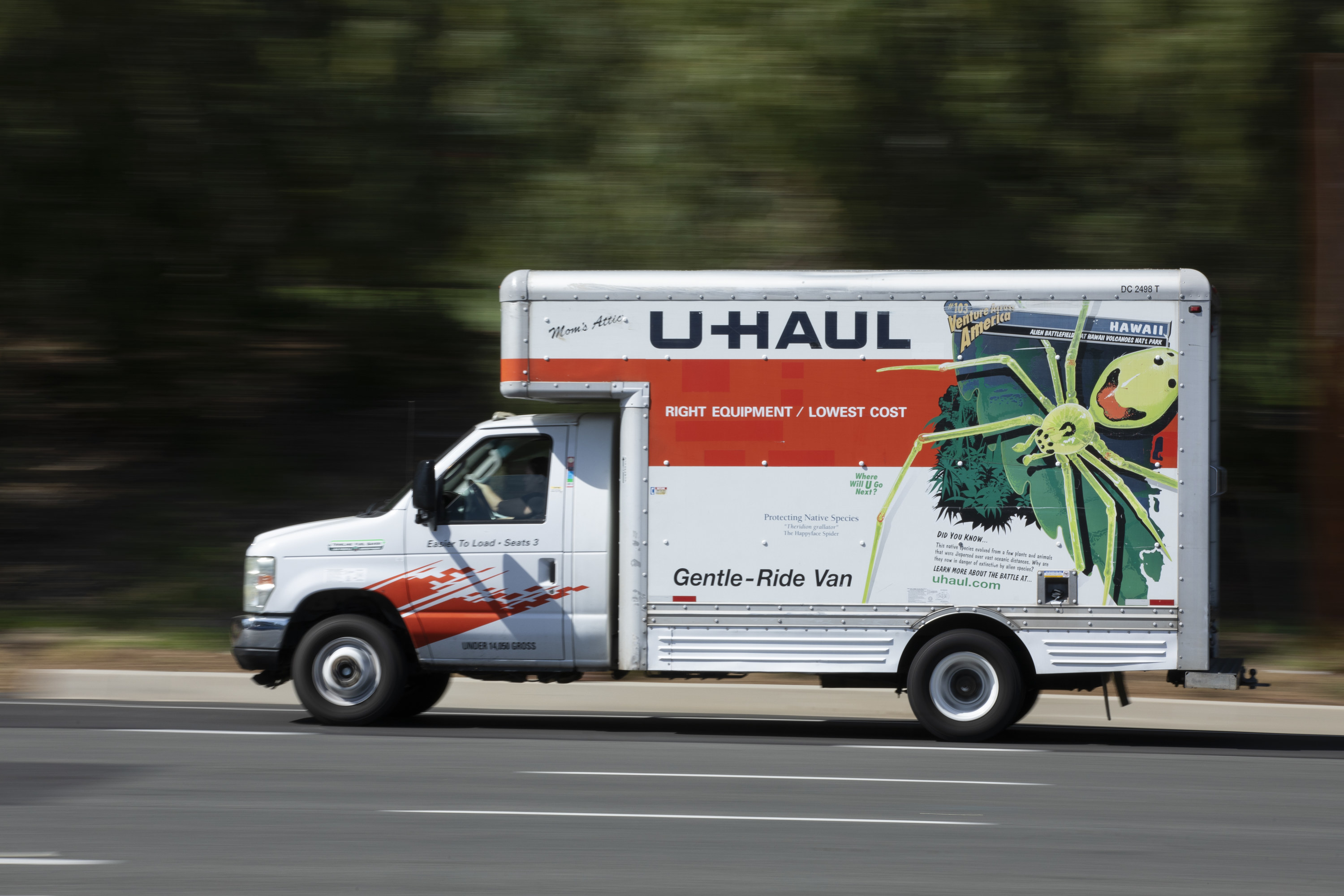 a uhaul driving on the highway