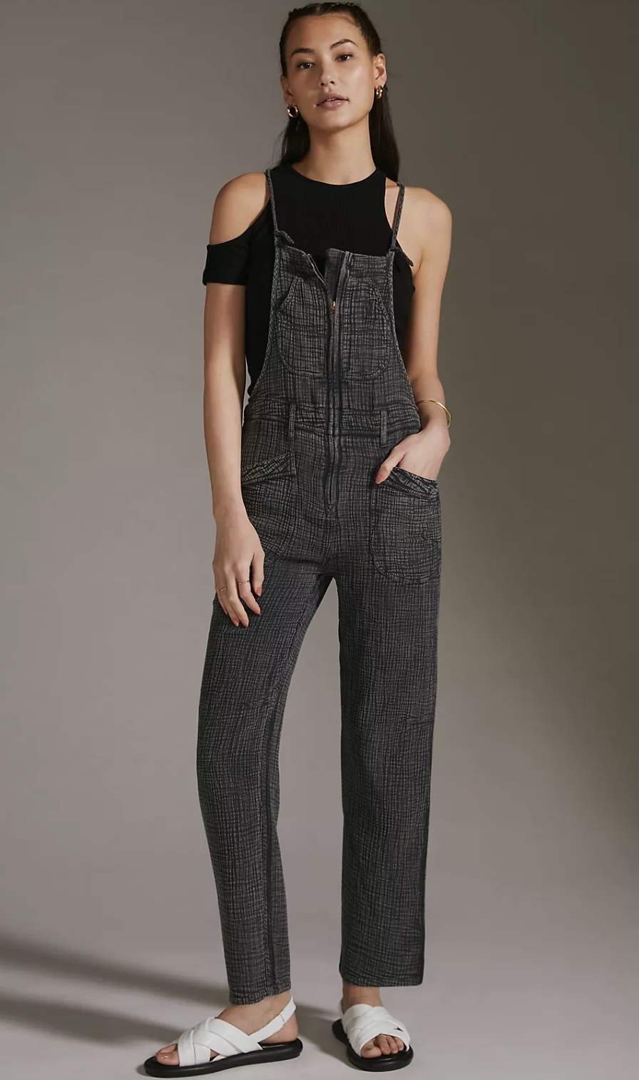 a model wearing the overalls in black