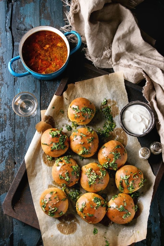 a tray of baked dinner rolls