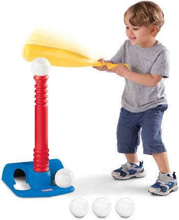 A child model with the baseball set