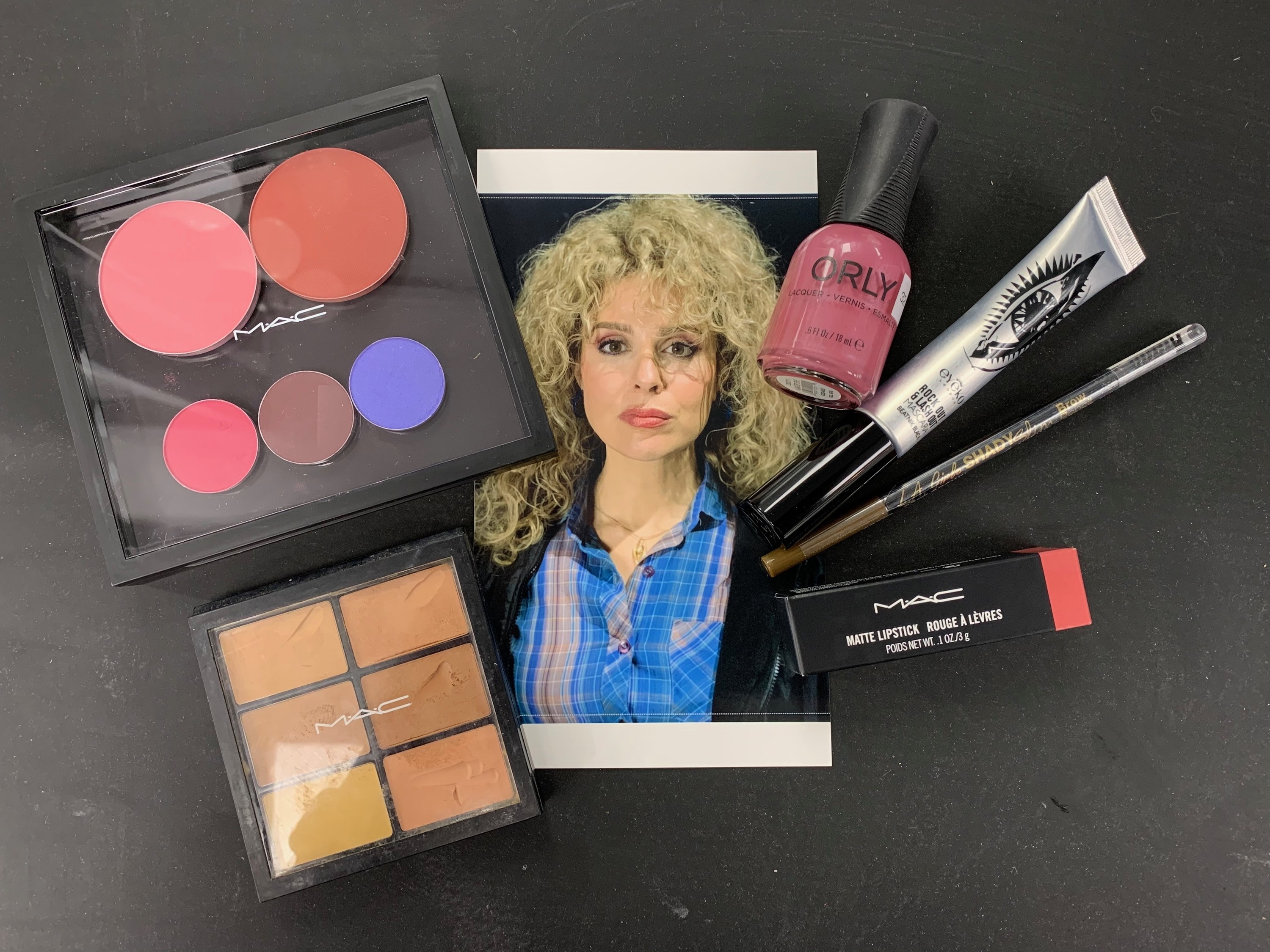 A layout of a picture and makeup products