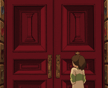 Chihiro standing in front of double doors that opens automatically and in a domino sequence revealing a hallway of doors opening one after the other