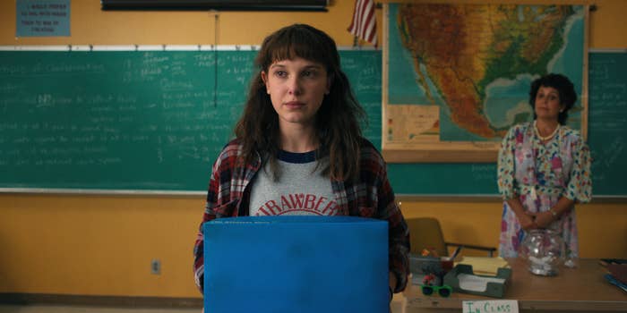 Millie Bobby Brown as Eleven with long, slightly disheveled hair in Stranger Things