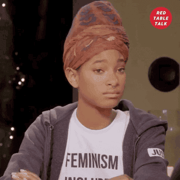 Willow Smith wearing a feminism T-shirt and rolling her eyes